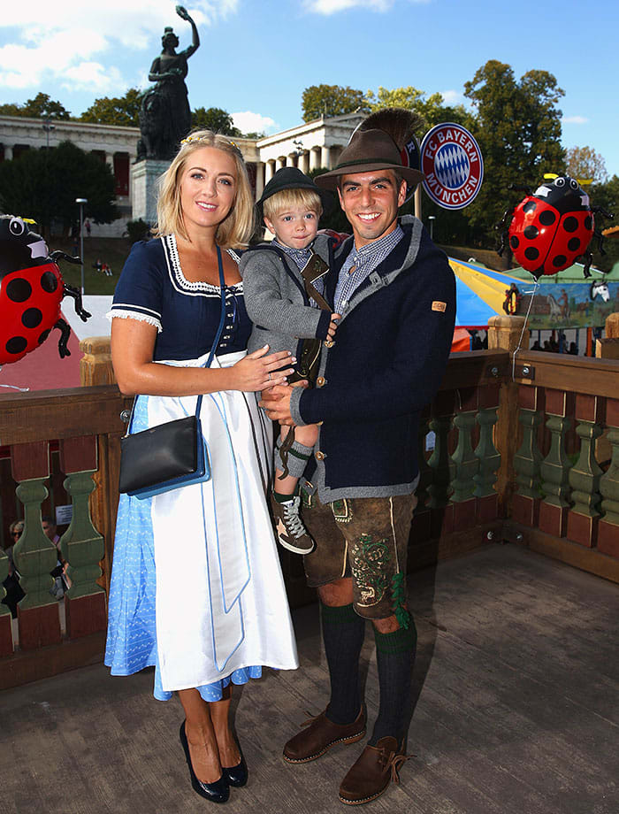 Philipp-Lahm-wife-Claudia-son-Julian-Oktoberfest-490651870.jpg
